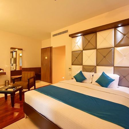 Hotel Sanman Gardenia Bangalore Esterno foto
