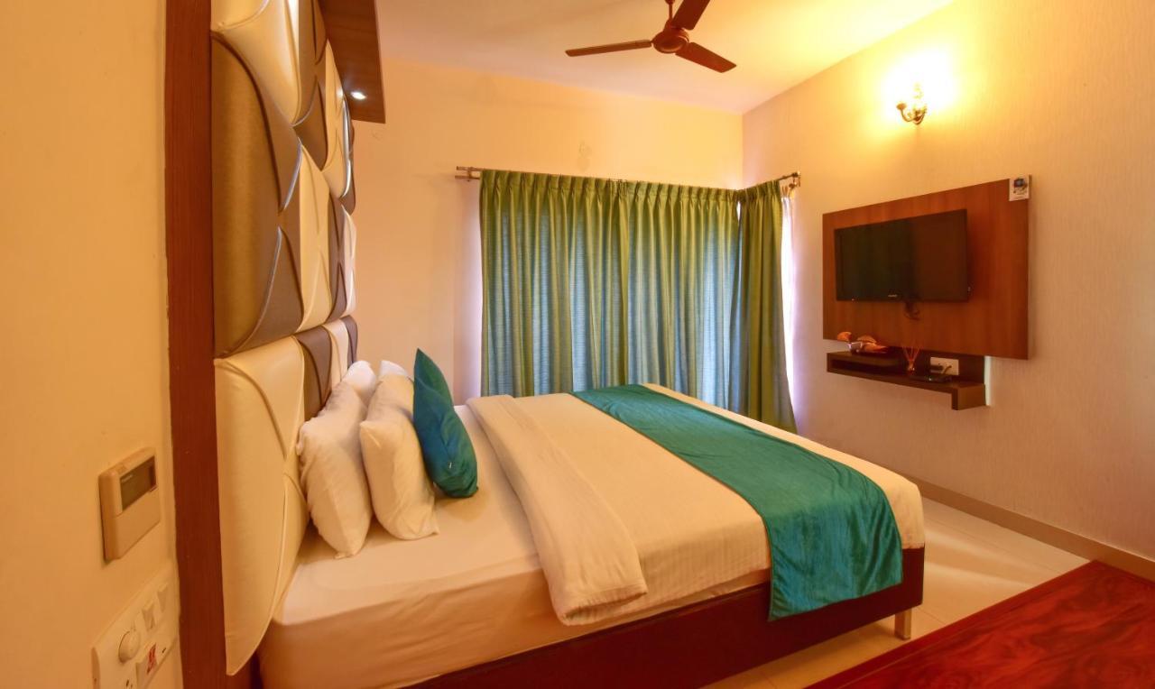 Hotel Sanman Gardenia Bangalore Esterno foto