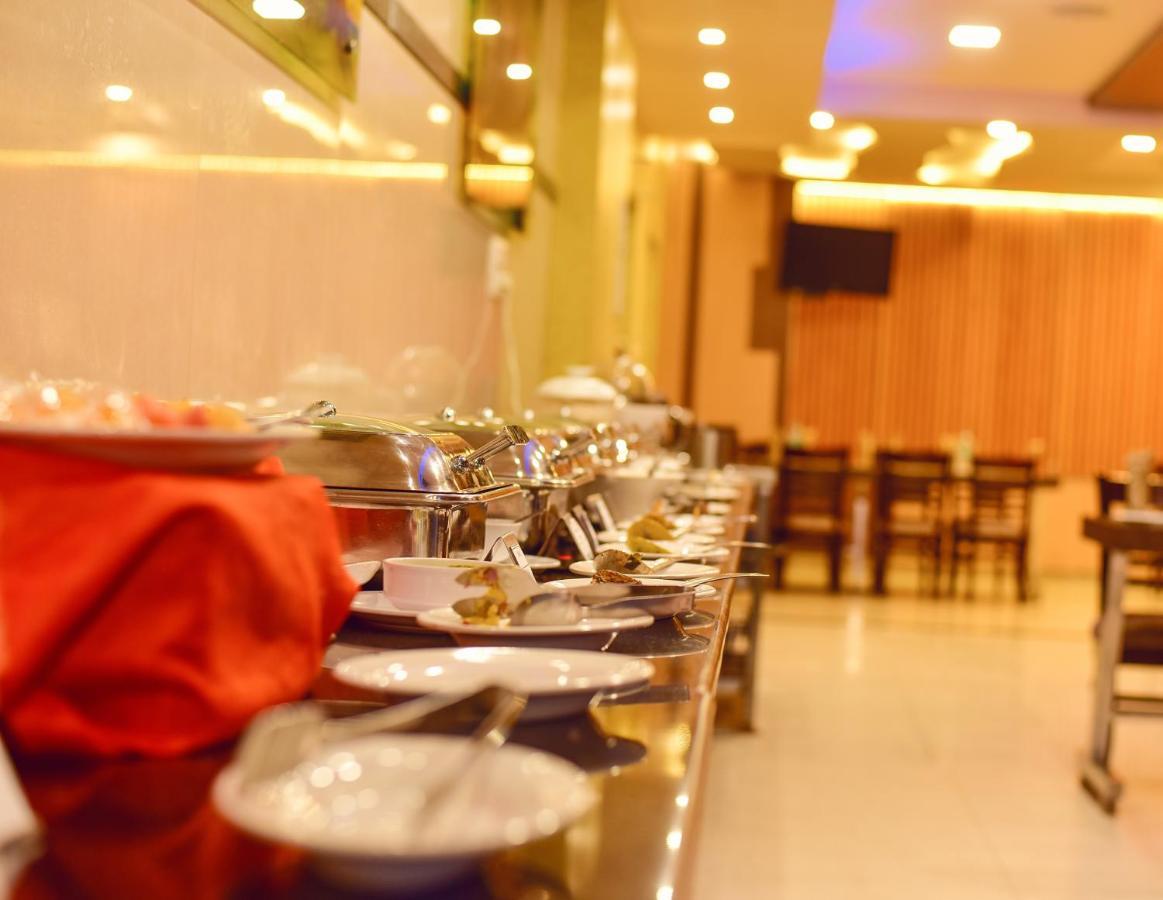 Hotel Sanman Gardenia Bangalore Esterno foto
